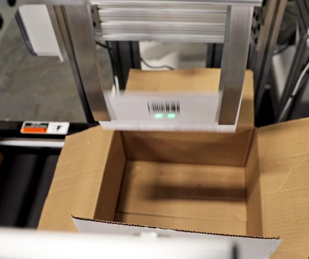 A packing slip machine in action
