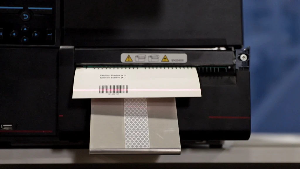 A thermal pack slip inserter printing a label
