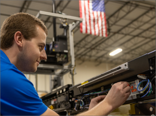 A man working with a print and apply system